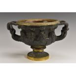 A Grand Tour parcel-gilt and dark patinated bronze vase,