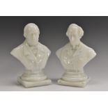 A pair of Victorian pressed opaque white glass political portrait busts,