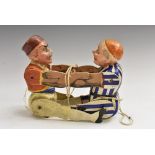 A 19th century polychrome softwood and gesso articulated caricature toy,