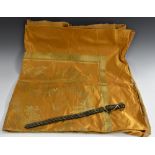 A 19th century Chinese coin sword, of typical form, 50cm long; a Chinese silk hanging,