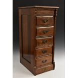 A late 19th/early 20th century teak floor standing office chest, possibly American,