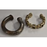 Tribal Art - an African white metal bangle or toric, possibly Benin,