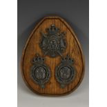 The Bourbon Restoration - a set of three French silver coloured metal armorial plaques,