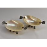 A pair of Russian silver filigree-mounted and mother-of-pearl open caviar dishes,
