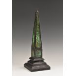 A 19th century slate and scagliola library obelisk, painted in faux malachite, 34.5cm high, c.