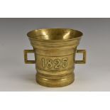 A George IV bronze mortar, flared rim, angular lug handles, 10cm high,