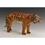 Folk Art - a polychrome carved and gessoed model, of an Indian Tiger, standing four square,