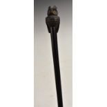 An early 20th century novelty walking cane, the pommel as an owl,