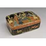 A Persian papier mâché and penwork rounded rectangular box,