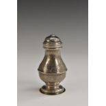 An 18th century silver coloured metal pear shaped pounce pot or muffineer,