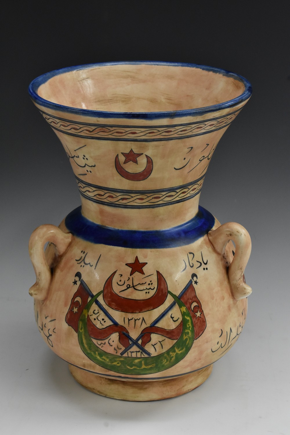 An Ottoman Turkish Islamic mosque lamp, painted in polychrome with star-and-crescent,