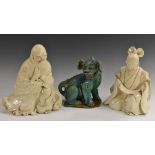 A 19th century Chinese Blanc de Chine figure, of a sage, seated with a scroll,