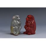 A Bernard Moore miniature model of a seated monkey, lustrous grey glaze, glass bead eyes, 5cm,