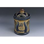 A Bailey Fulham stoneware tobacco jar and cover, incised with stylised feathers and foliage,