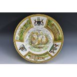 A Coalport The Derby Ram bowl, printed with ram to centre, the sides with Haddon Hall,