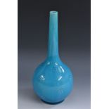 A Burmantofts gourd shaped bottle vase, slender elongated neck,