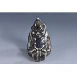 A Bernard Moore novelty miniature figure of a seated imp, mottled lustrous grey glaze, 6cm,