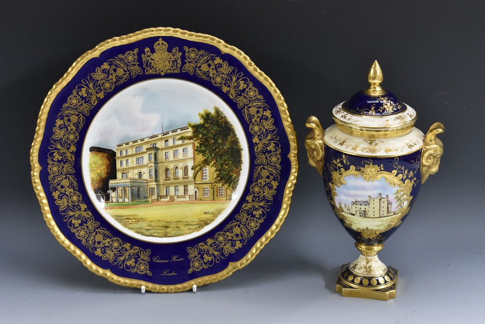 A Coalport pedestal vase, Castle of Mey, 26cm high, limited edition 78/100; a Coalport plate,