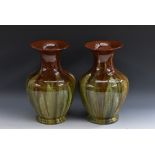 A pair of Torquay Pottery Linthorpe type baluster vases in the manner of Christopher Dresser,