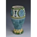 A Carlo Manzoni earthenware vase, in the Della Robbia manner, decorated with roundels and chevrons,