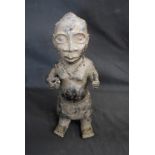 Tribal Art - a Benin bronze female figure, she stands, 29.
