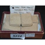 A set of six Middle Eastern clay tablets, 5cm x 3cm,