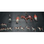 Toys and Juvenalia - a set of Britains lead huntsmen and hounds