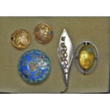 Jewellery - a Chinese enamel brooch; a gilt Art Nouveau brooch; another,