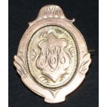 A 9ct gold badge, 5.