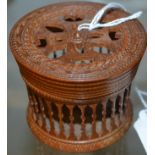 An early 20th century sandalwood circular cricket cage,