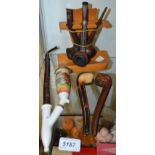 Smoking Interest - a treen pipe rack holding three pipes; a cased Meerschaum pipe;