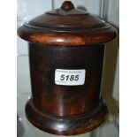 Treen - a 19th century lignum vitae cylindrical string box, turned cover, skirted base, 17cm high,