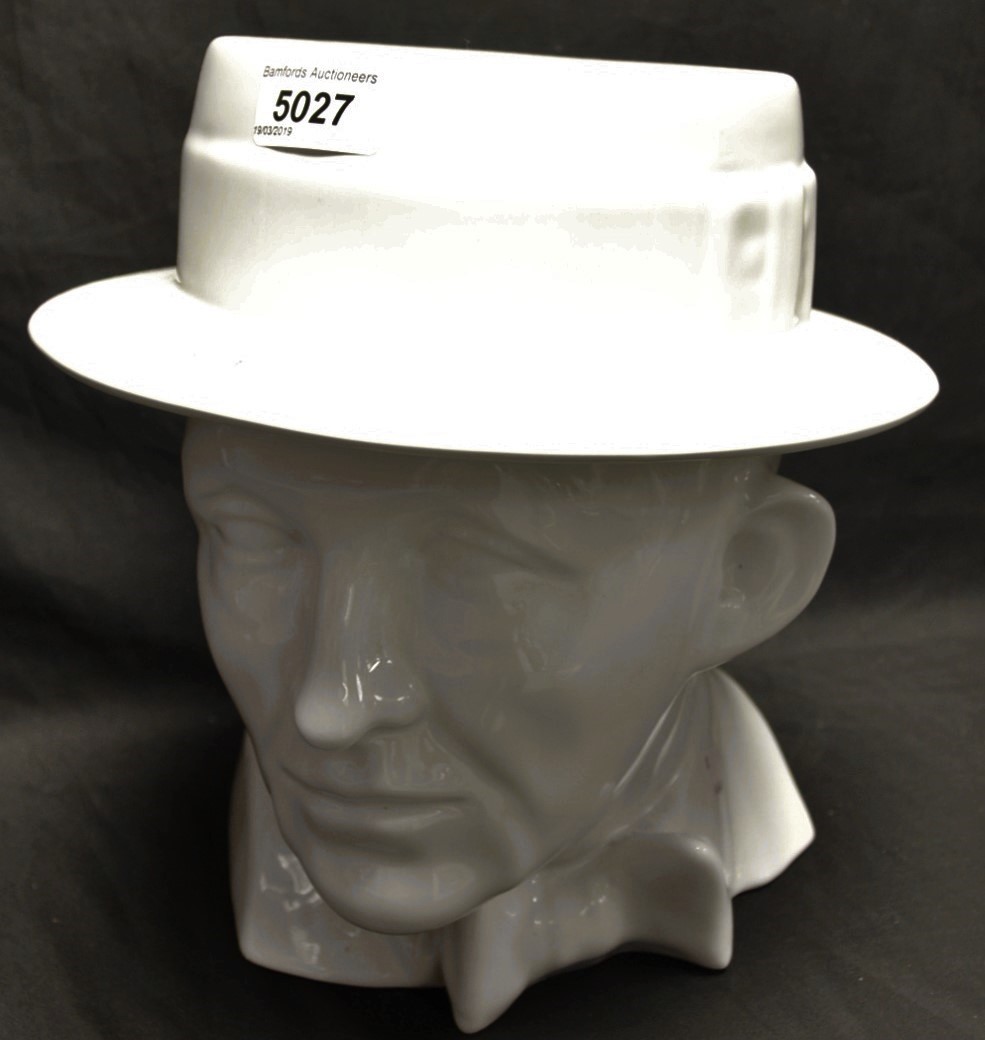 A Qualitas ceramic head of Bing Crosby, white glaze,