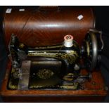 A Singer manual sewing machine,