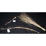 A Colonial fly whisk, turned hardwood haft, 69cm long overall,