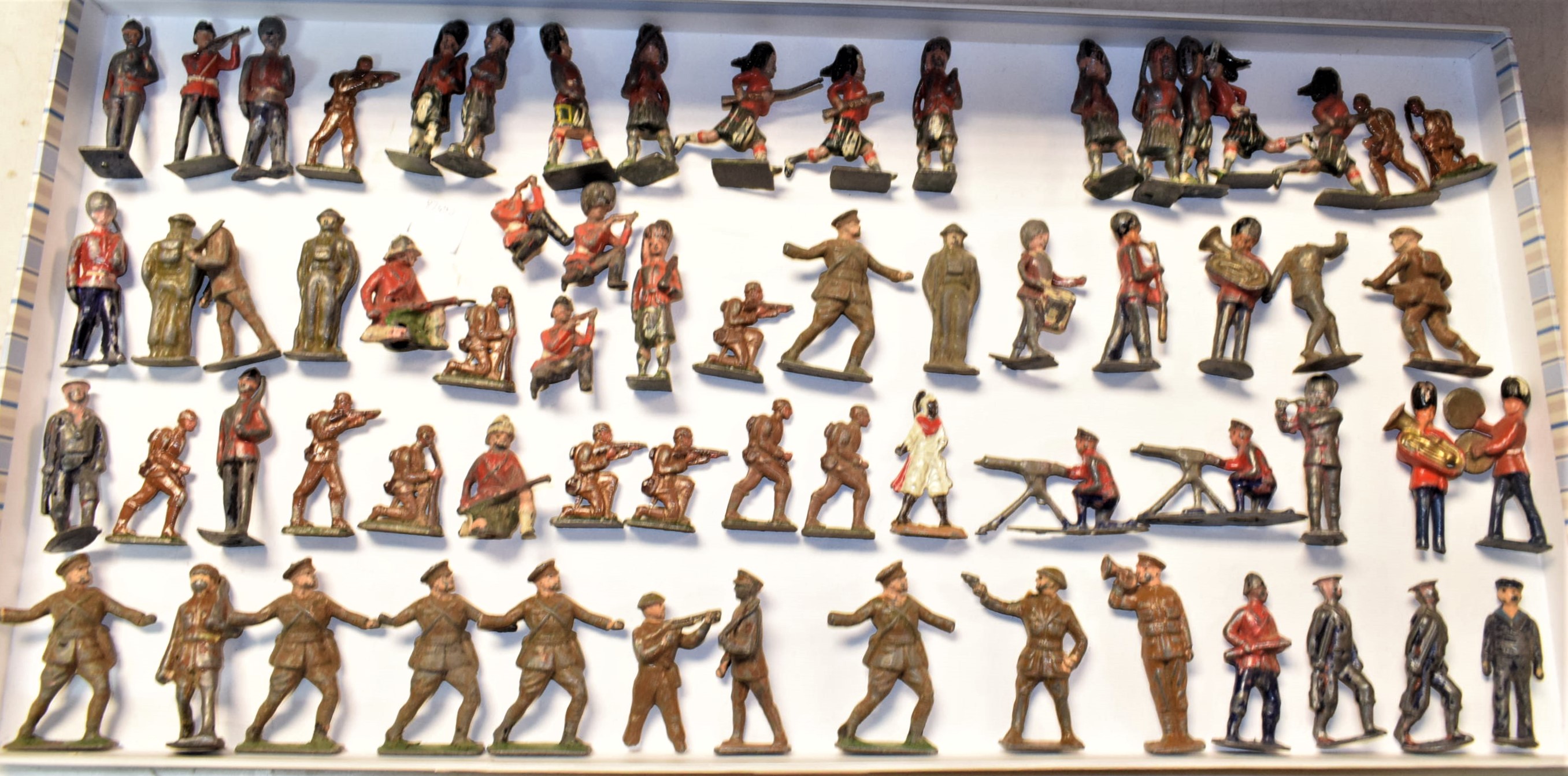 Toys and Juvenalia - a quanity of Britains and other lead soldiers,