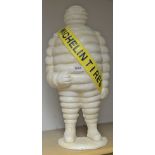 Advertising - a large reproduction cast iron door stop, of The Michelin Tyre Man, standing,