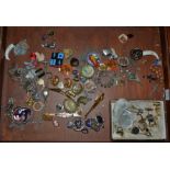A counter top display case containing 1930s and later jewellery, mother of pearl counters,
