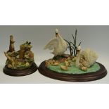 A Country Artist family group model CA506 swans, another cast, 68 Otter, with waterfall, (2).