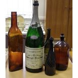 An empty 1977 Laurent Perrier Champagne Methuselah , another Jeroboam (unlabeled),
