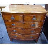 A Victorian bow front chest of two short cockbeaded drawers over three graduated long,
