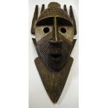Tribal - an African comb mask.