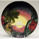A Moorcroft pottery Year plate '2000' decorated with 'Birth of Light' pattern,
