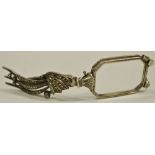 An Unusual Edwardian Marcasite Clip Incorporating a pair of spring folding lunettes,