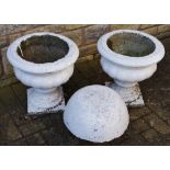 A pair of reconstituted stone painted campana urns;