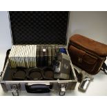 Various Cokin SLR Lens Filters, heavy duty camera case, an early hand held Yaschica camera,
