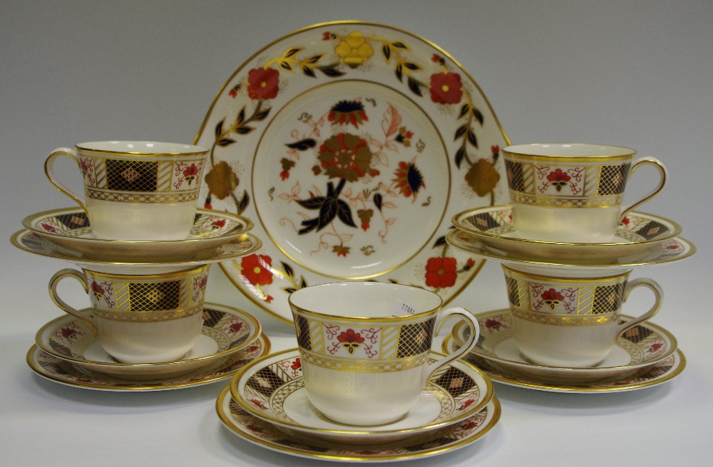 A Royal Crown Derby border pattern part tea service, comprising five tea cups and saucers,