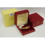 A 9ct gold lady's Omega watch, manual movement, integral strap, boxed, gross weight 22g,