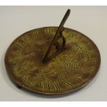 A brass sun dial