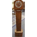 An early 20th century walnut Bentima miniature long case clock 143cm height